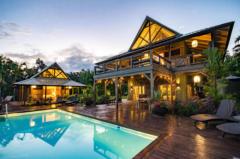 Main house and master suite at twilight