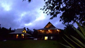 Night shot of main house and master suite               